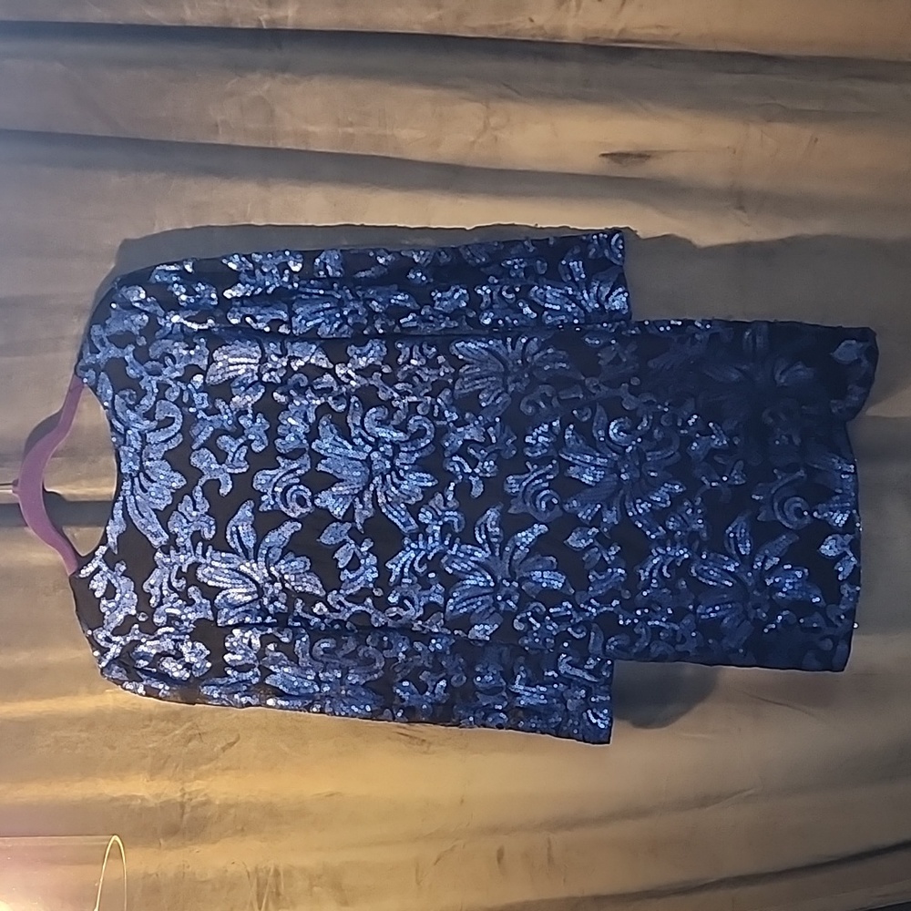 Blue sequin on black net lined scoop back dress. Size 8 new